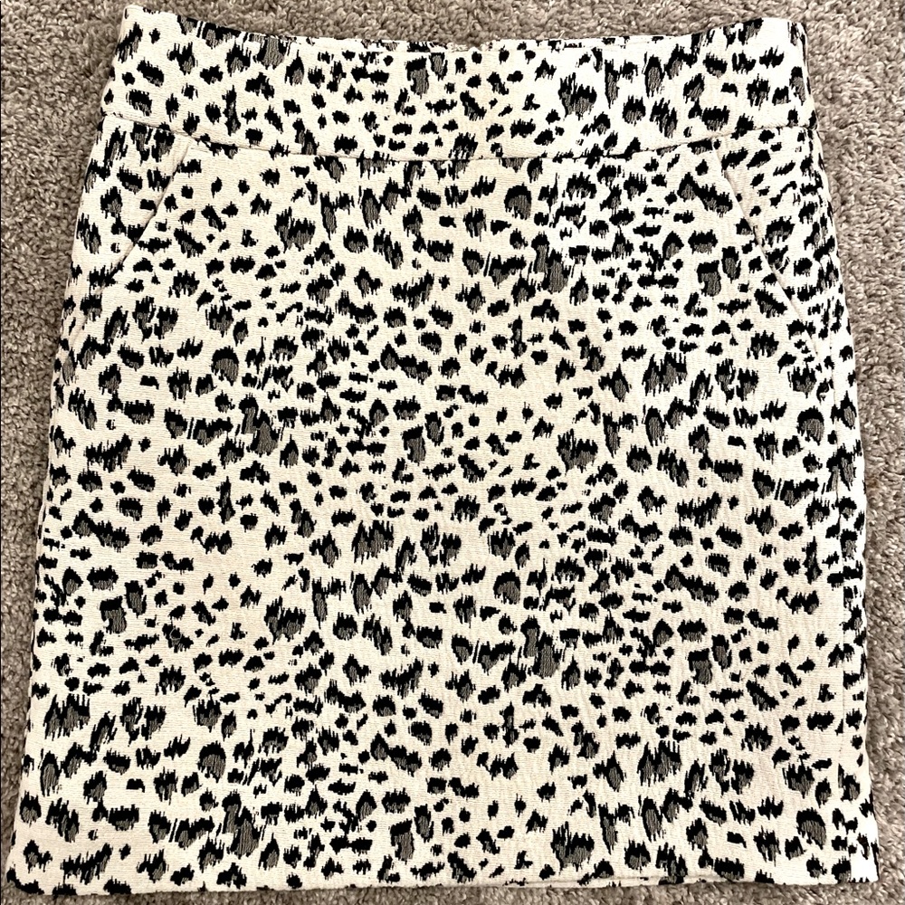 Loft skirt slightly above the knee.